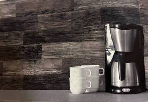 lot 4698 image: RoomMates RMK4043GM Black Barn Wood Plank Peel and Stick Giant Wall Decals.