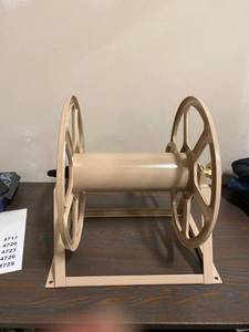 lot 4717 image: Tan Hose Rack