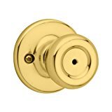 lot 695 image: Kwikset Tylo BedBath Knob in Polished Brass