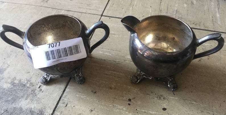 lot 7077 image: SMALL SILVER POTS- mfg stamp indicates F B ROGERS SILVER CO., Trademark 1883, number stamp 1083