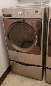 lot 100 image: Kenmore Elite Front Load Washer and Pedestal - Model 79642198900