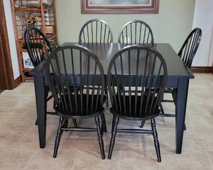 lot 110 image: Wood Dining Room Table with Leaf (18) and 6 Matching Chairs - Table 36 x 54 x 30 - Black Weathered Design - Total Length of Table with Leaf is 72 - Matches Lots 109, 221 and 266
