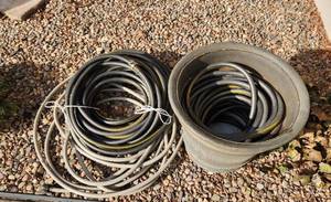 lot 404 image: 3 Water Hoses and Large Planter 21 x 17