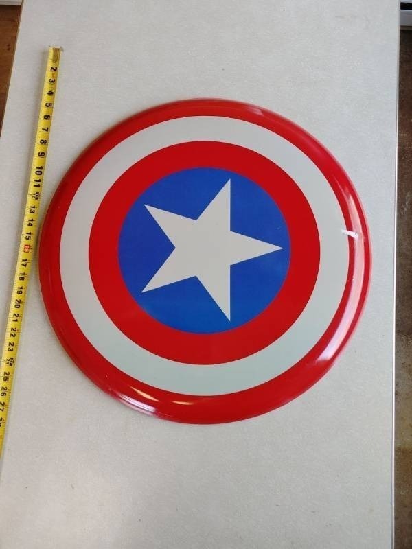 lot 5 image: Captain America Shield 24 inch Button Tin Sign