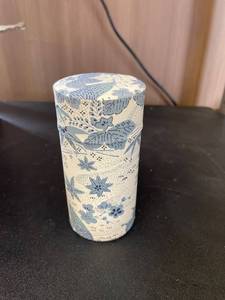 lot 379 image: Fabric Covered Tin Tea Container - 5 oz.