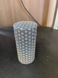 lot 384 image: Fabric Covered Tin Tea Container - 5 oz.