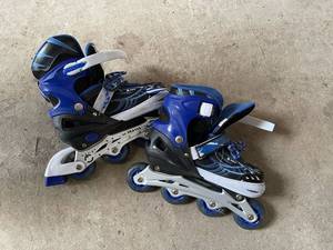 lot 409 image: XMBT Skates Black and Blue Roller Blades - Size L