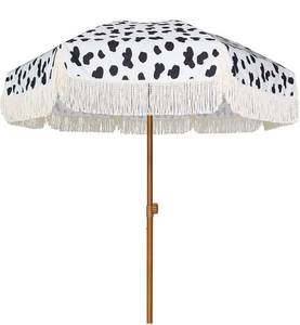 lot 56929 image: AMMSUN 7ft Patio Umbrella with Fringe Outdoor Tassel Umbrella UPF50 Wood Color Steel Pole and Steel Ribs Push Button Tilt,Cow Polka Dots
