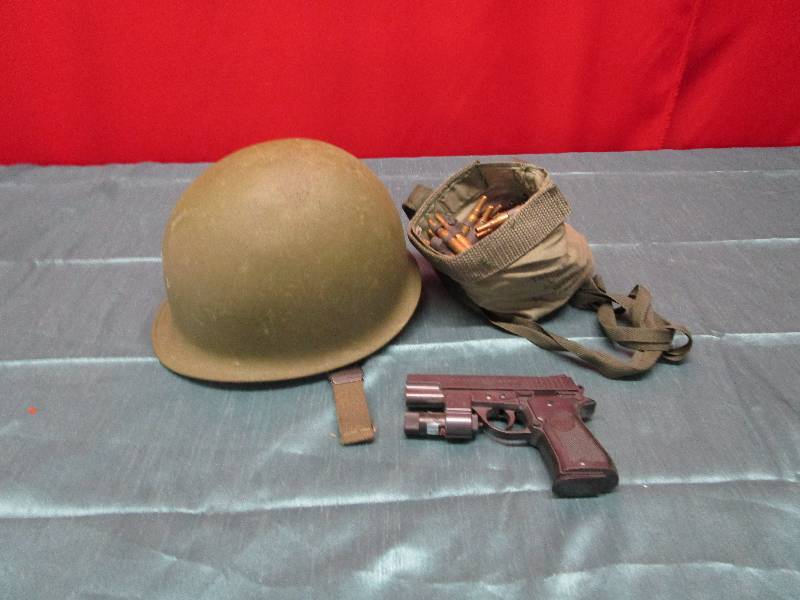lot 8228 image: Vintage helmet ammo and more