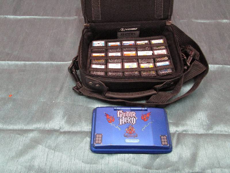 lot 8215 image: Lot of Nintendo DS games and machine