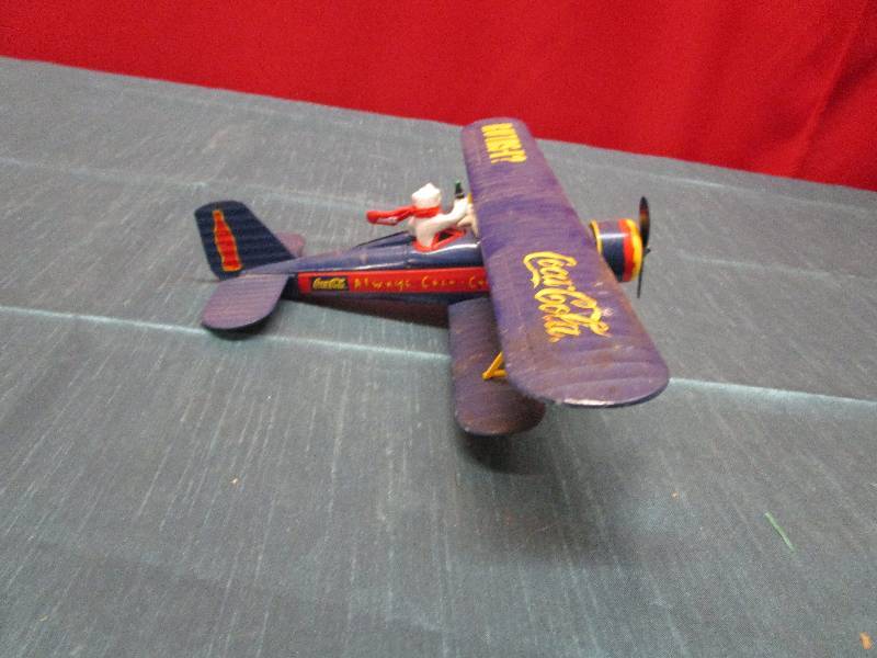 lot 8014 image: Coca Cola diecast metal airplane
