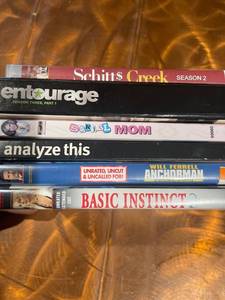 lot 13192 image: 8 DVD Movies Basic Instinct 2, Anchorman , Analyze This, Serial Mom, Entourage Season 3 Part1 , Schitt$ Creek Season 2