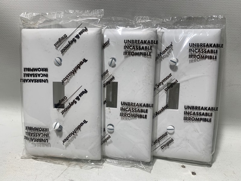 lot 374 image: 20 New Standard Sized TradeMaster White Unbreakable Switch Plates