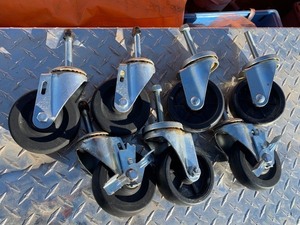 lot 12 image: Set of 7 - 4 JH Caster Wheels w Breaks