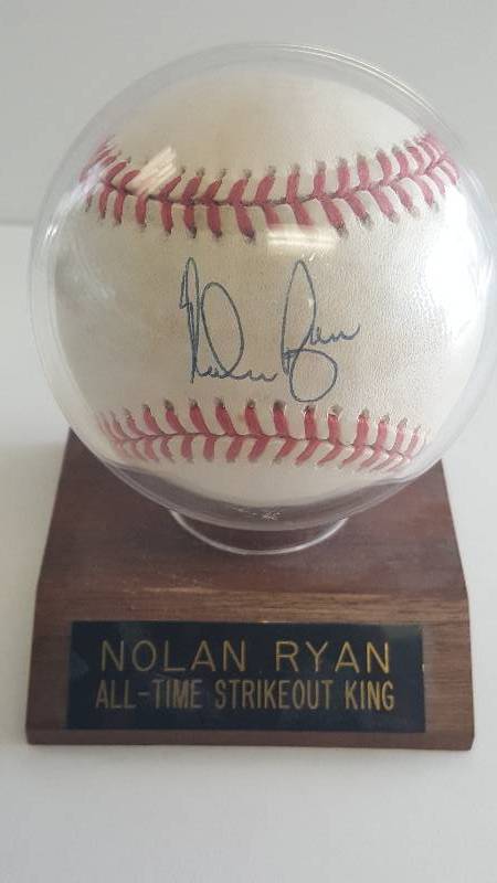 lot 2044 image: Nolan Ryan Autographed American League Official Baseball w Display Stand