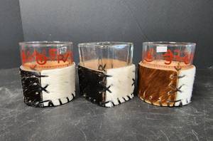 lot 178 image: 3pc New Drink Glasses in Leather Hair on Hyde Koozies