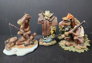 lot 107 image: Hunting Elmer 0104#2781 5.5, Fishing Elmer 0104#1075 6, and Saddle Statue