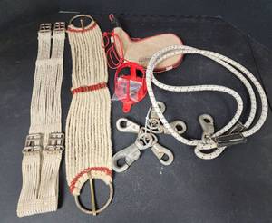 lot 332 image: Saddle Cinches, Coleman Canteen, Bridle Rack, Large Bull Snaps, and Lead Rope