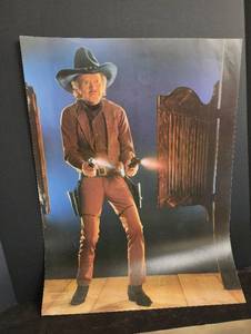 lot 72 image: Autographed Picture of Arvo OJala Hollywoods Legendary Gun Coach