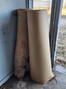 lot 383 image: (2) Rolls of Very Heavy Brown PaperCardboard 48 Wide (some moisture damage to ends)