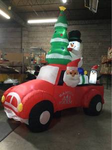 lot 3011 image: 8 Feet Wide Inflatable Santa Claus Driving a Car with LED and Air Blower