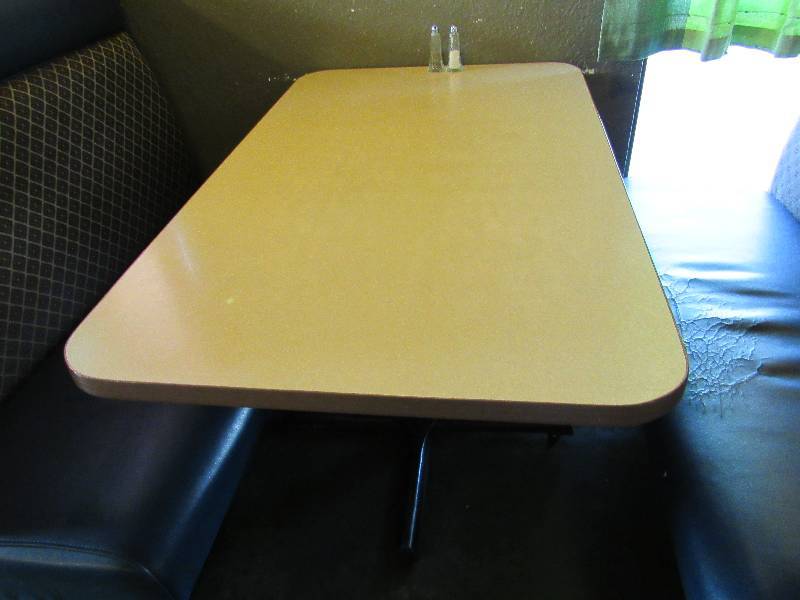 lot 1432 image: Light Tan Laminated Top Single Metal Base Dinning Table