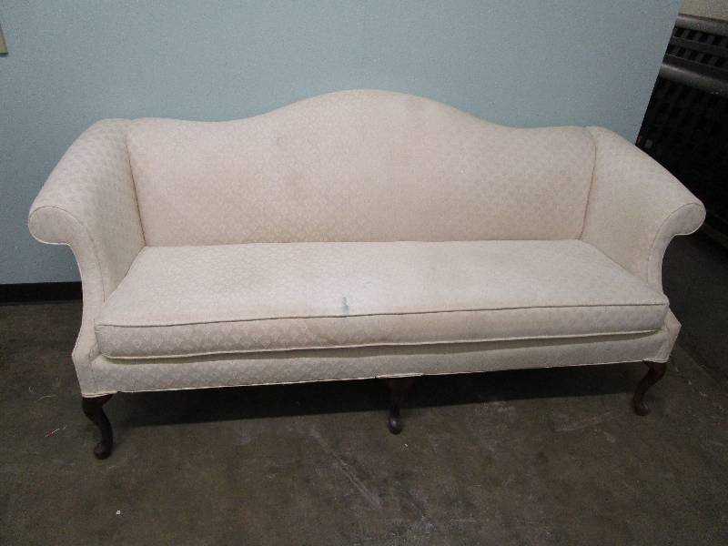 lot 423 image: Cream colored antique couch will need to be cleaned