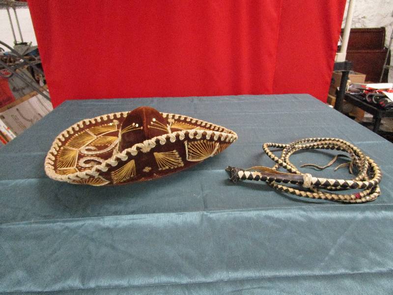 lot 498 image: Sombrero and Whip
