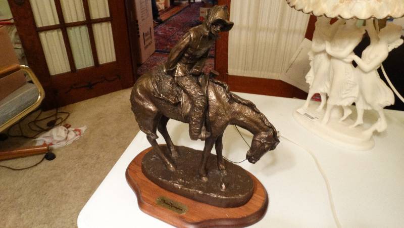 lot 871 image: The Norther branze statue by Fredric Remington.