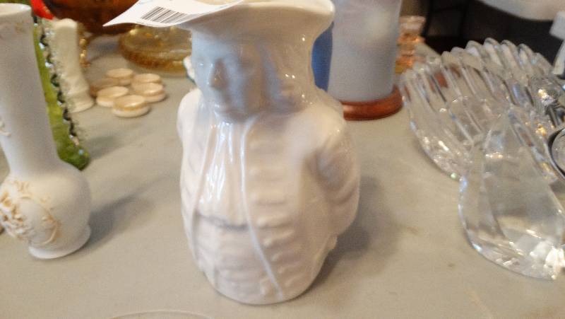 lot 912 image: Decorative pitcher.