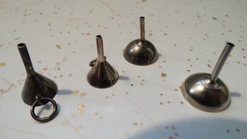 lot 969 image: 4 old miniature funnels.