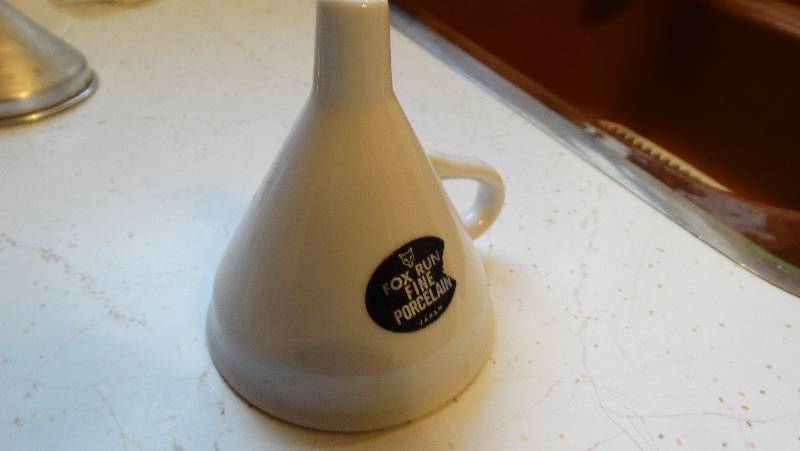 lot 972 image: Fox sun fine porcelain funnel.