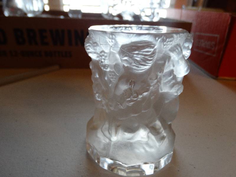 lot 1275 image: Cherub candle holder.