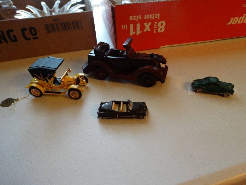 lot 1280 image: 2 - small cars ( plastic praline Cadillac wGermany) & metal 1941 Plymouth coup) (alloy forms incmade in 1984 USA wheels does not roll.