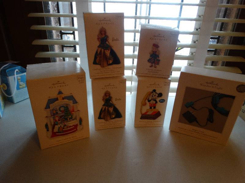 lot 1281 image: Lot of 6 keepsake orientalists magic cord - 2 barbie, Micky mouse, yuletide shopper (made me a lexander).