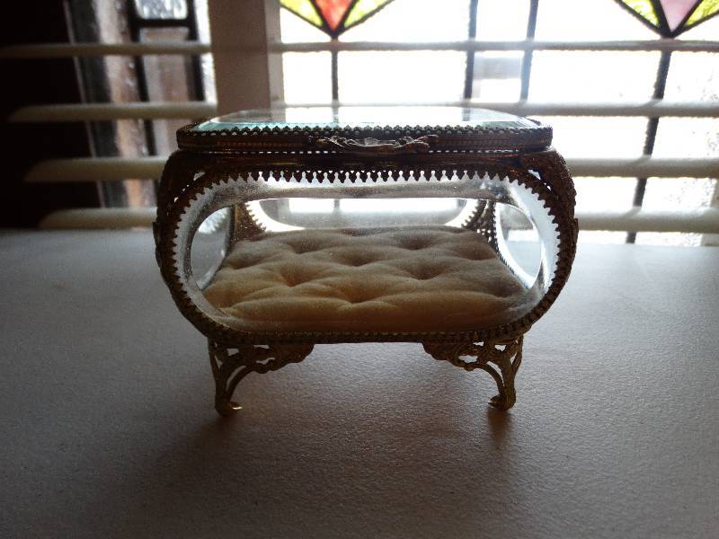lot 1292 image: antique bronze box & beveled glass jewelry reliquary footed box hinged lid - buttoned velvet padded cushion interior.