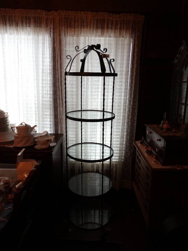 lot 1248 image: Round metal & glass shelf w4 shelves about 74 high & 18 12  wide.