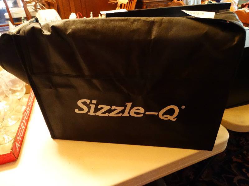 lot 1253 image: Sizzle-Q for a grill.