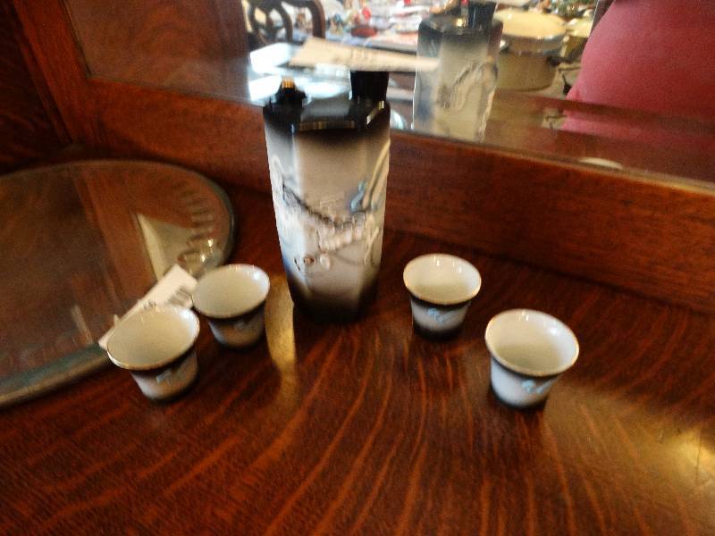 lot 1257 image: Asian decanters w4 glasses.