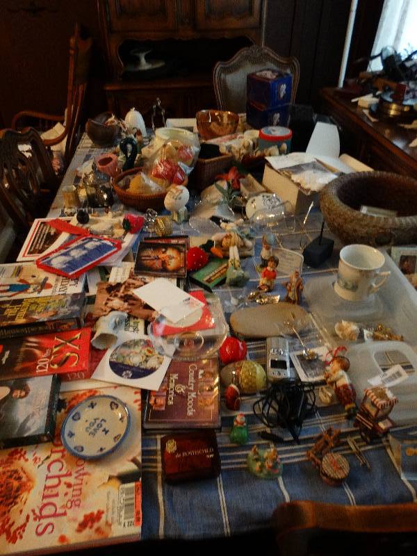 lot 1265 image: Large lot of planting books, cook books, assorted books, home decor, cell phone wcharger, CD, swan, baskets & much, much more.