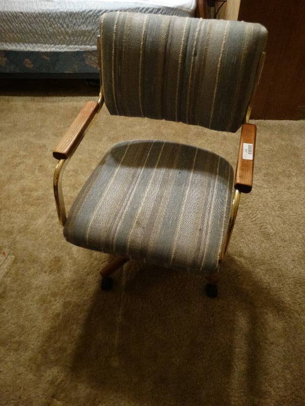 lot 1303 image: Matching chairs on wheels.