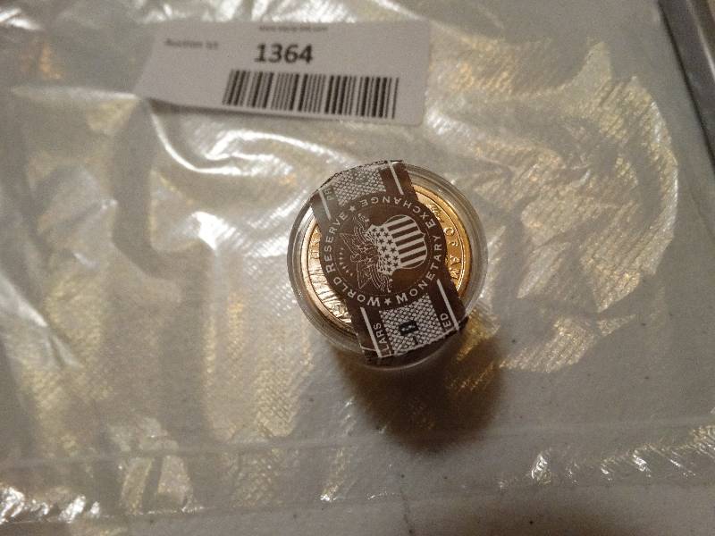 lot 1364 image: 12- Thomas Jefferson gold dollars in case never circulated.