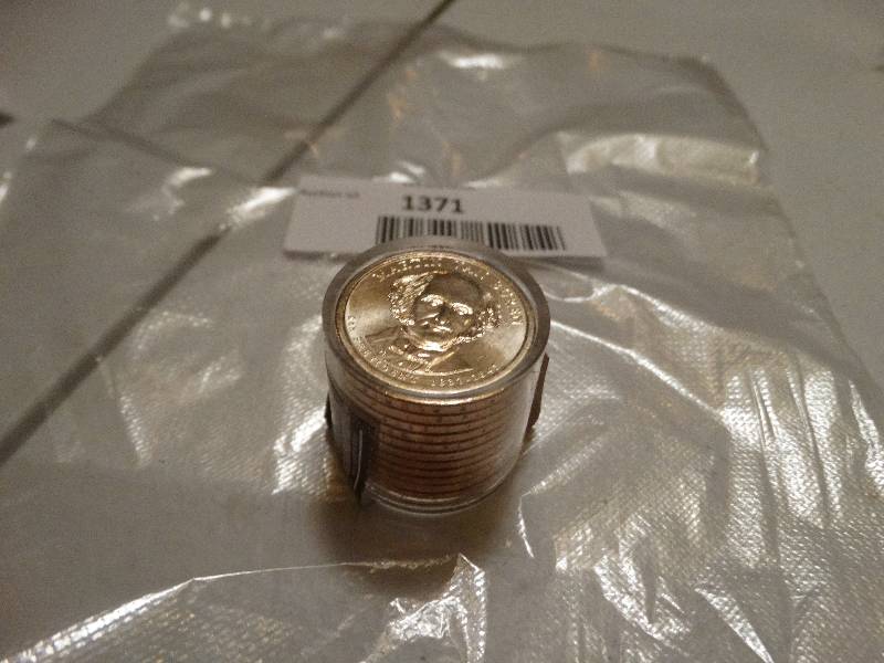 lot 1371 image: 12- Andrew Jackson gold dollars in case never circulated.