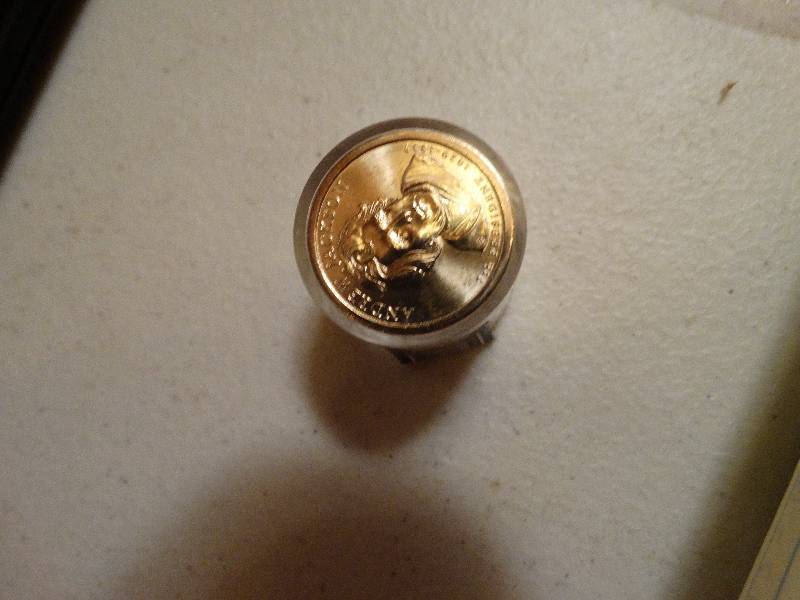lot 1374 image: 12- Andrew Jackson gold dollars in case never circulated.