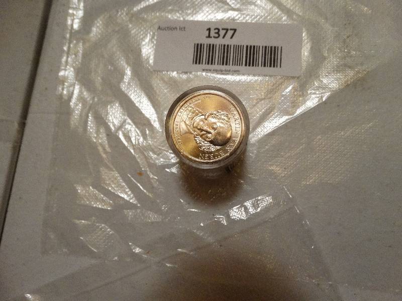 lot 1377 image: 12- Martin Van Buran gold dollars in case never circulated.