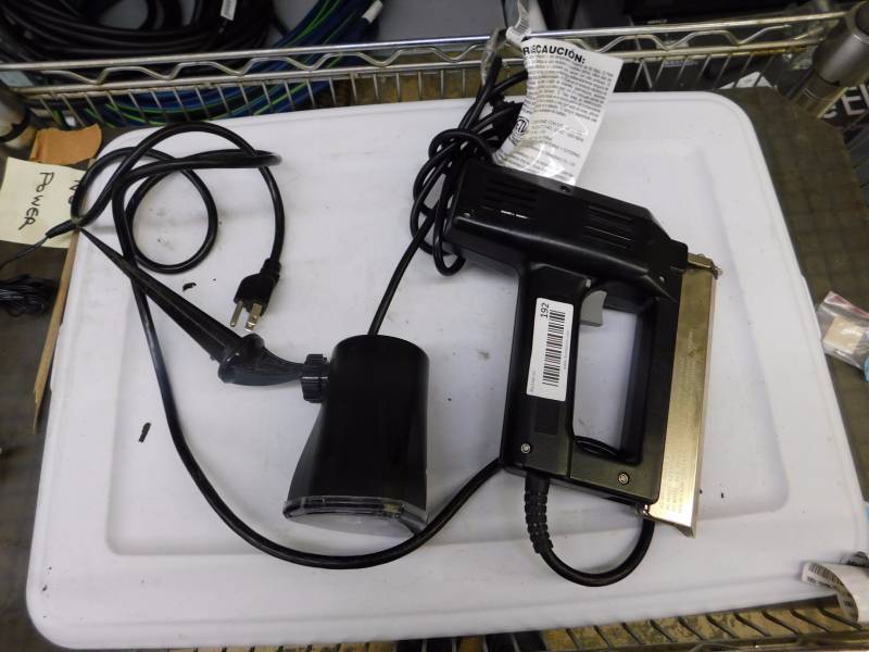 lot 192 image: electric stapler and light
