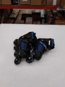 lot 67625 image: Caroma kids roller blades size medium, wheels light up when rolling