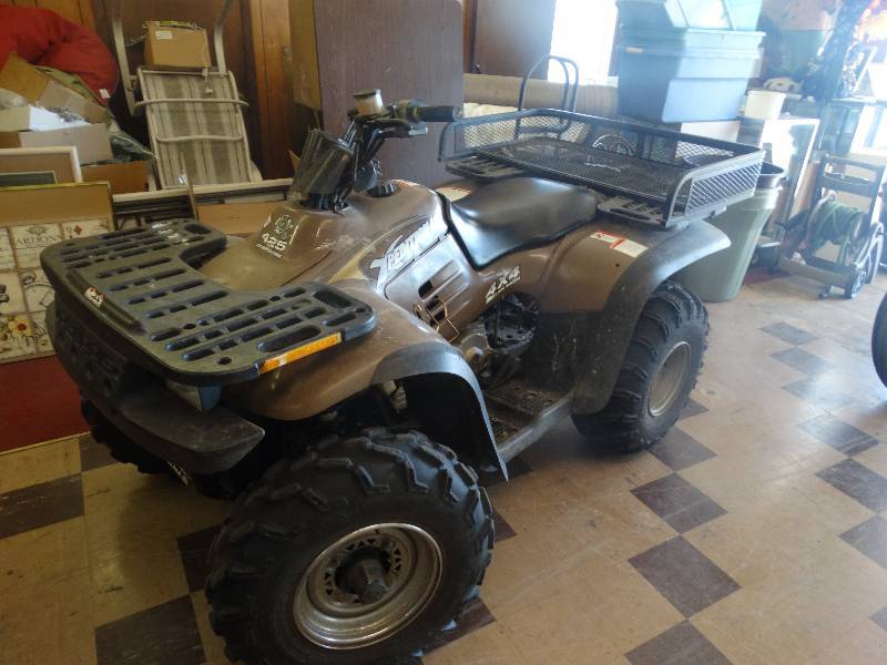 lot 310 image: Polaris xpedition 425 4x4 shaft ride system, 5 - speed wcarry rack. RunsDrives