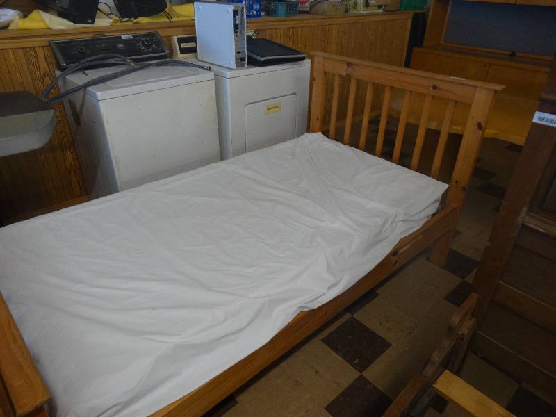 lot 315 image: Twin sized bed nice wooden bed frame.