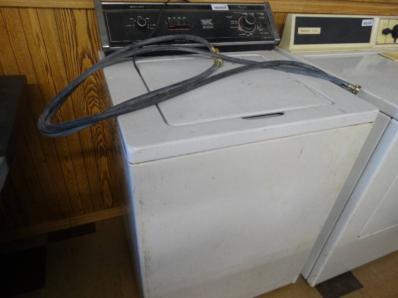 lot 318 image: Whirlpool heavy duty top load washer.